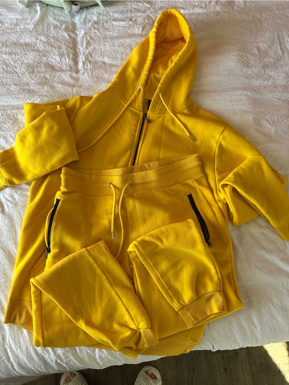 Two Rudolph Sportswear Yellow and a Red Hooded Zip-Up Sweatshirt